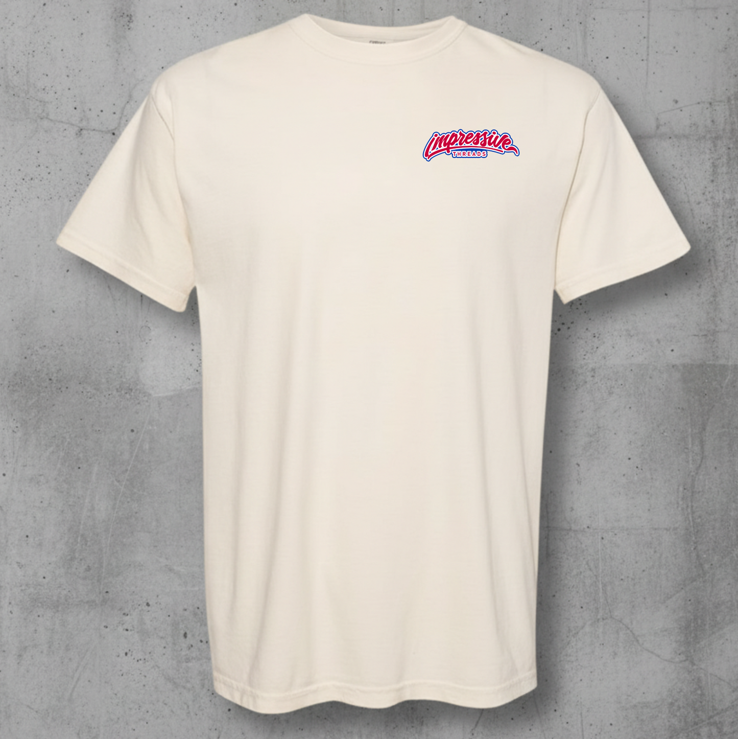 ivory  t-shirt with impressive threads on a gray concrete background
